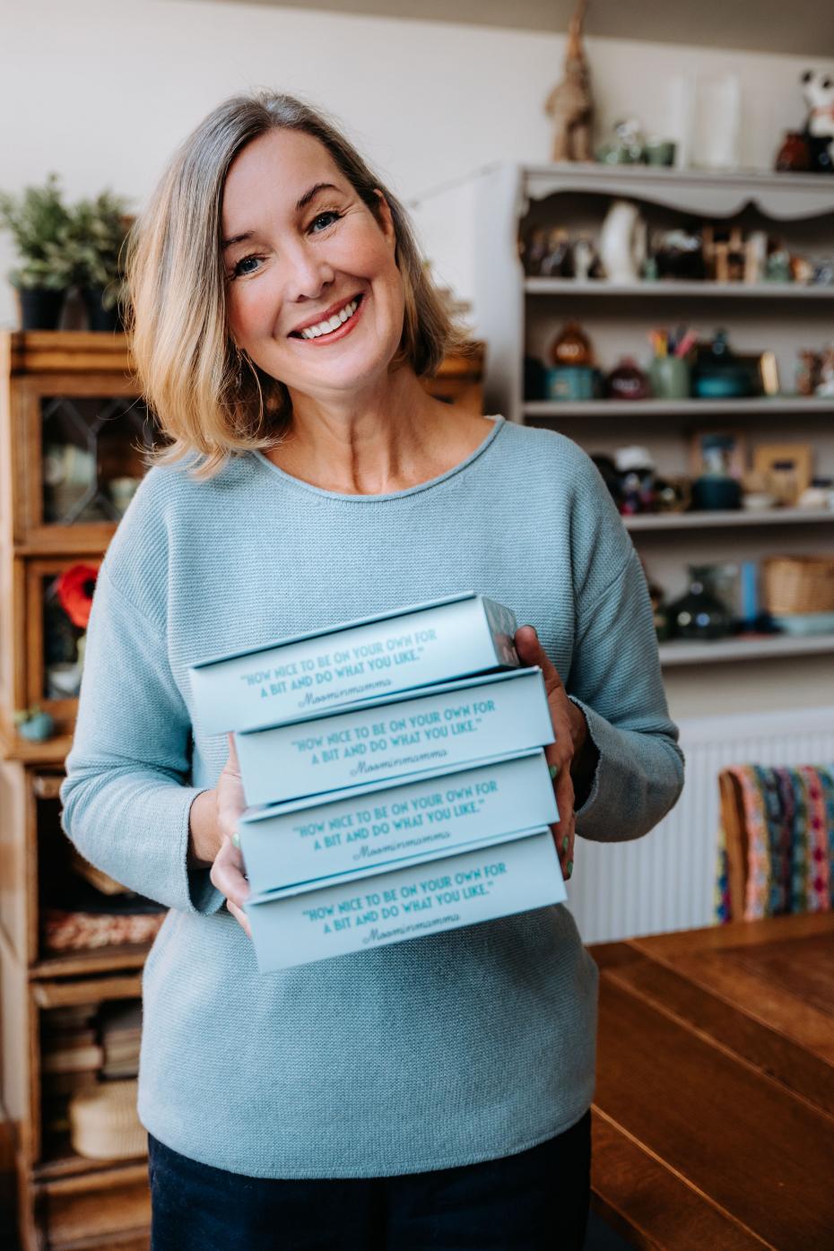 Jo Lochhead with Moomin boxes