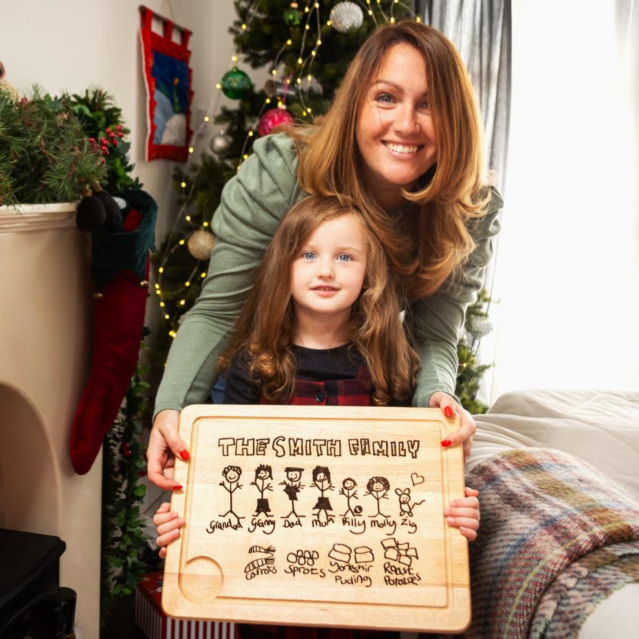 Personalised engraved chopping board with child's drawing of the whole family