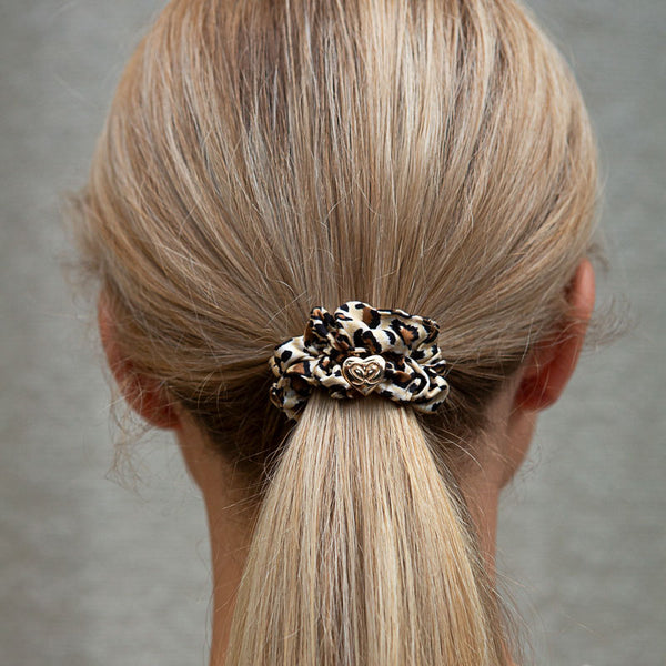 Leopard silk scrunchie in the hair