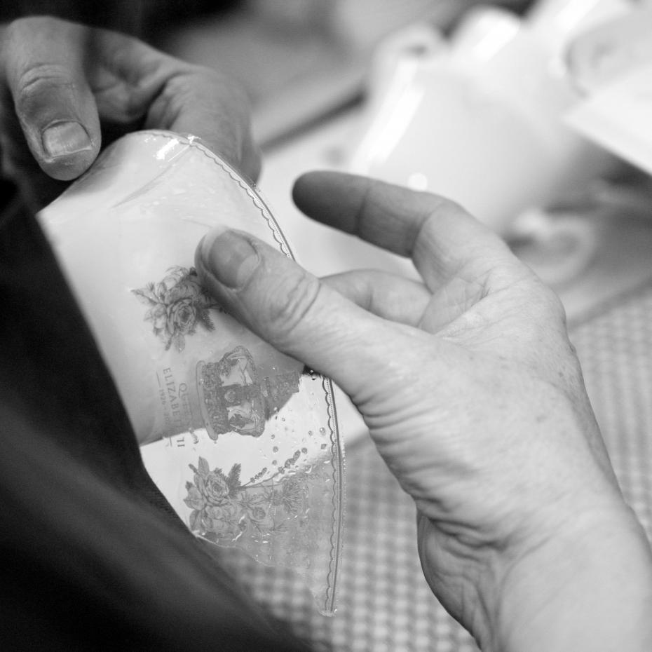 Hand decorating the Queen Elizabeth II Commemorative Cup and Saucer